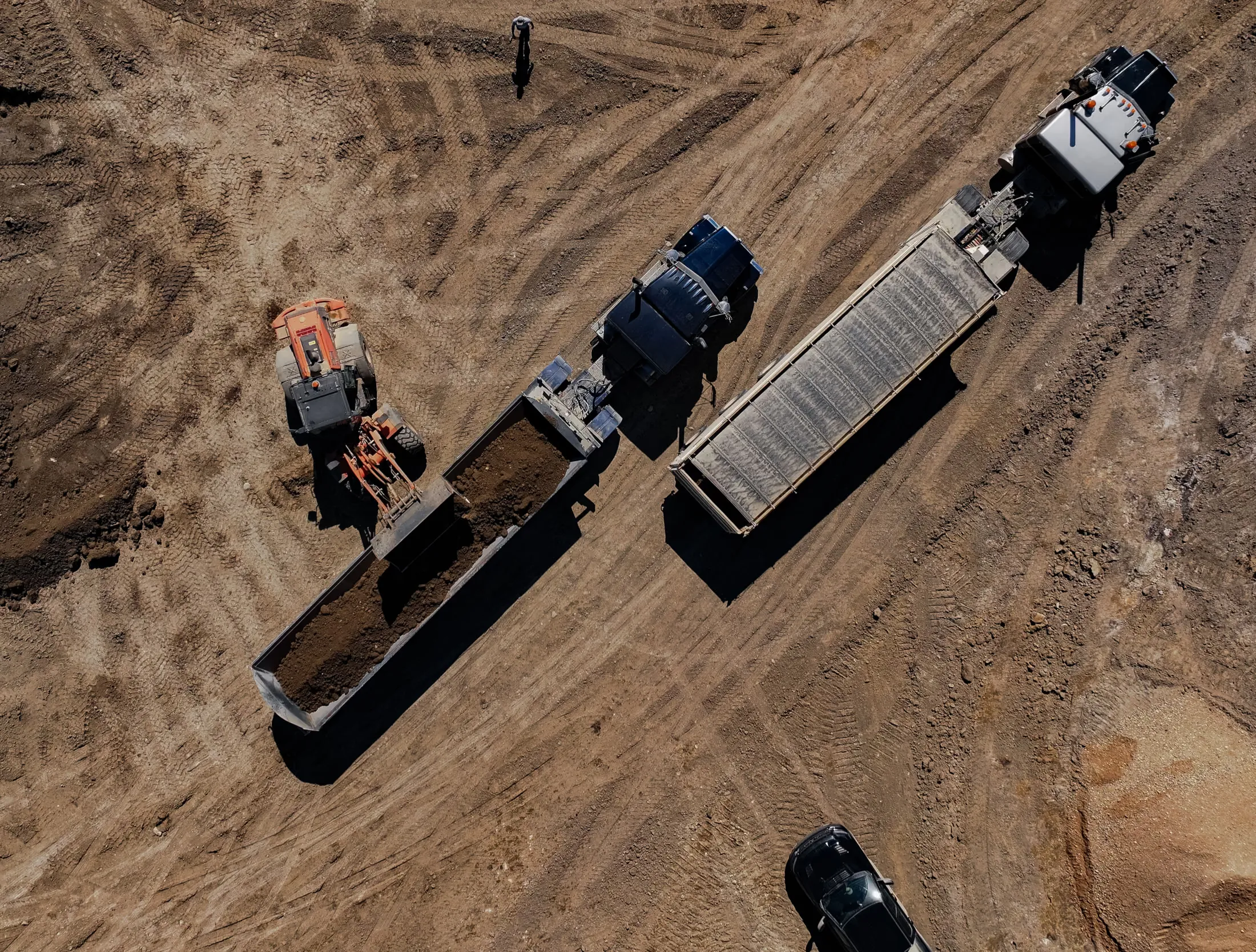 Hard Work Industries earthmoving equipment working a Saskatchewan job site