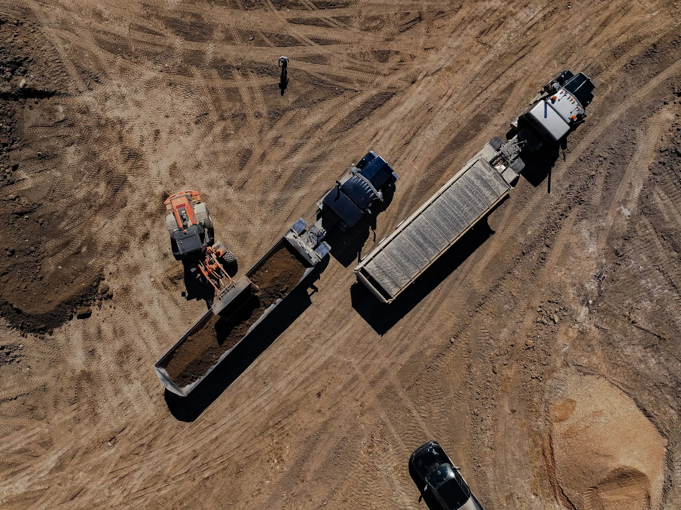 Wide view of an active Hard Work Industries earthworks site