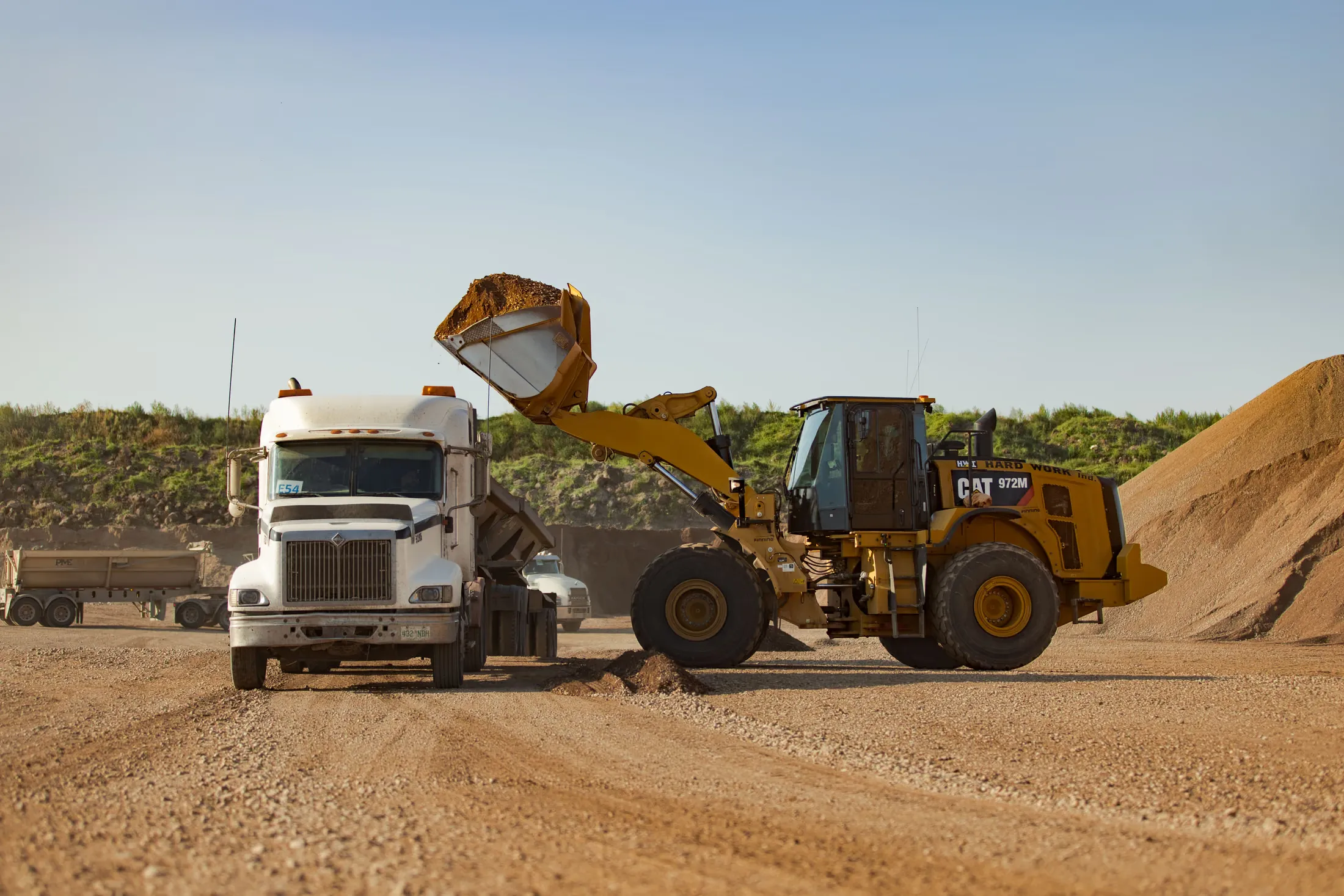 Large wheel loader on a Hard Work Industries site